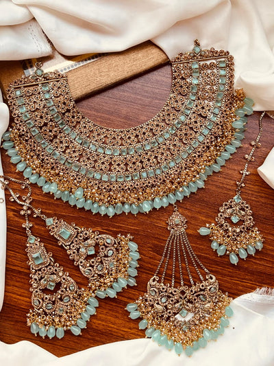 Luxurious Rose Gold and Pink Bridal Kundan Choker Jewelry Set with Jhoomar and Tika